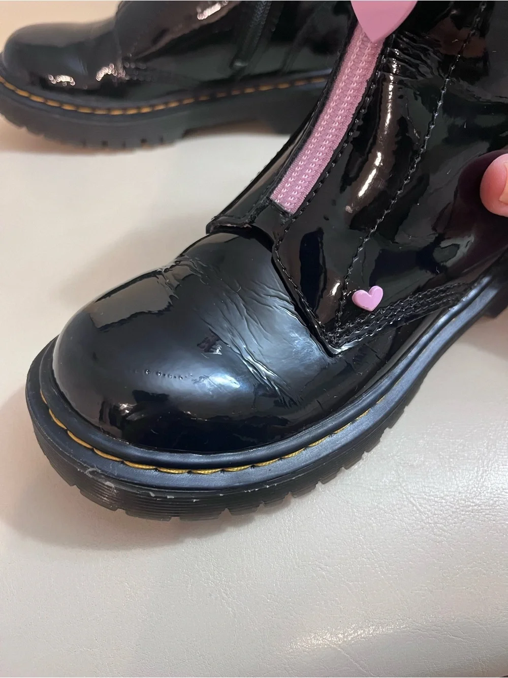 Kids Dr. Martens Black Patent Heart Accent Boots with Pink Lining